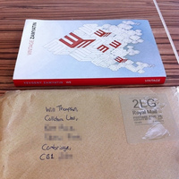 photo of the book and the hand-addressed envelope